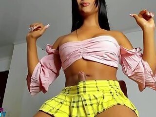 Carmina Teases In Skirt As She Strokes Huge Cock To Climax!