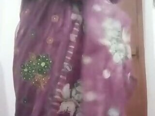 Indian Gay Crossdresser Bottom Gaurisissy showing her big boobs in purple saree