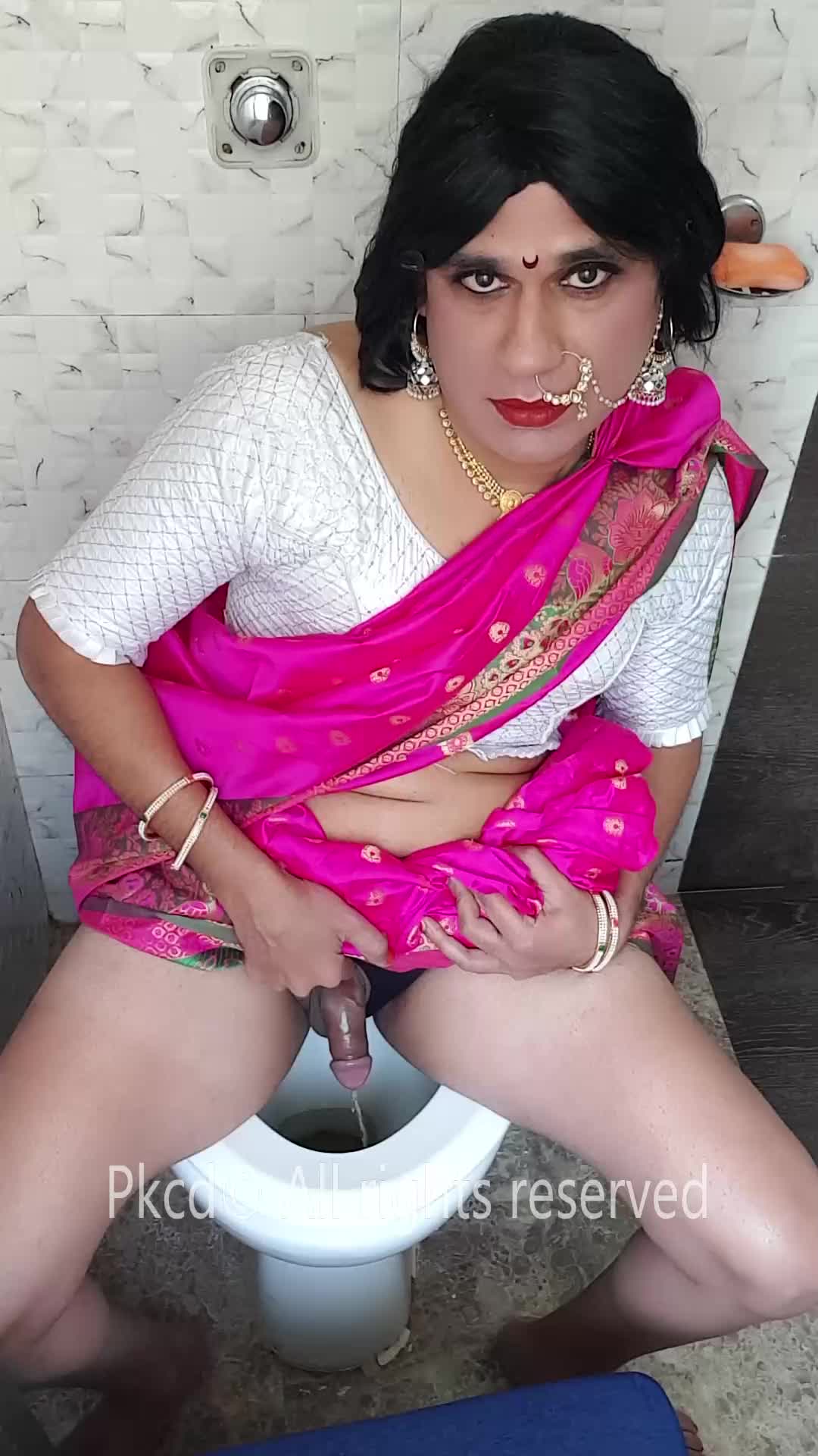 Crossdresser Payal pees, cums and drinks own cum