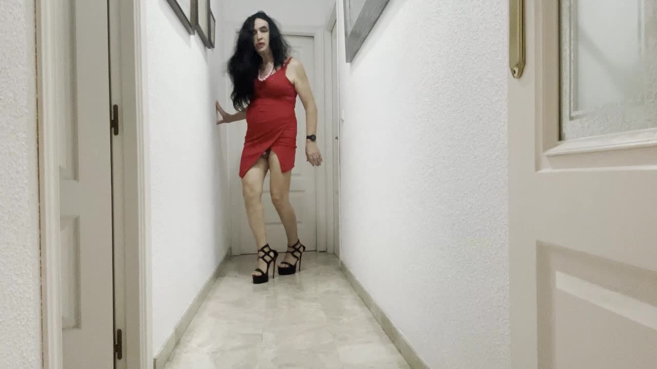 Spanish trans girl Spanish shemale, posing sexy in the hallway, beautiful legs, high heels