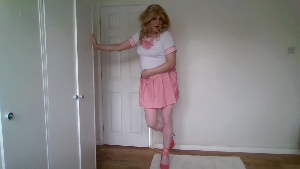 Taking my skirt off in a white and pink uniform and stockings