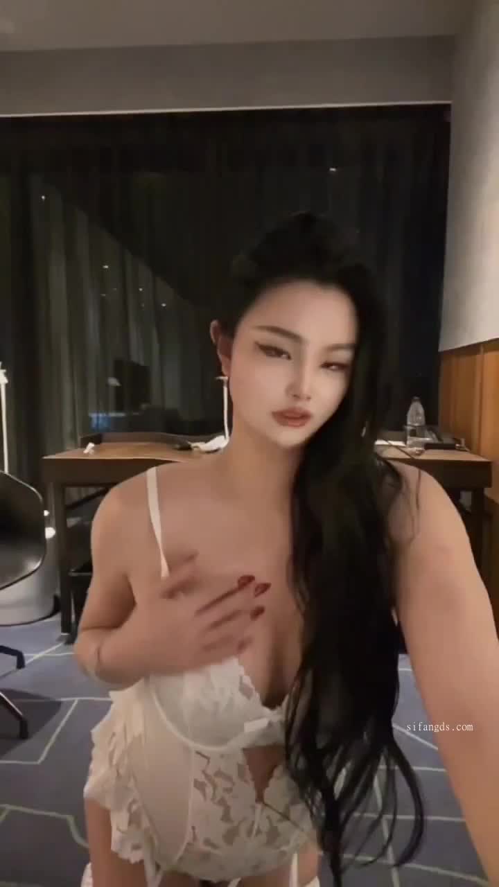 Chinese tranny in white silk lingerie gets fucked in the anus until she gets an orgasm